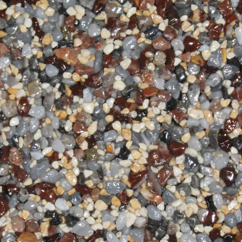 Dekorativer Belag aus Naturquarz: Steinteppich-Farbe Bunt - Ingwer 75/25 von Ketterer Fautz Sanierungen GmbH.